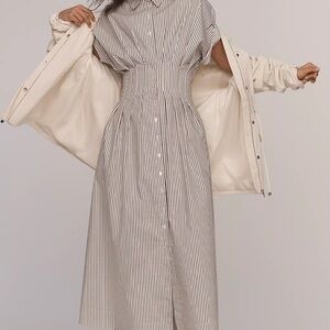 The Tobie Button-Front Pleated Shirt Dress by Exquise